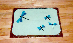 Wool hooked rug with dragonfly design 